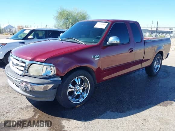 1999 Ford F-150 with VIN 1FTRX17W3XKB03527, listed as a IAAI auction lot 43450405 with 121,752 mi miles and . Bid and sale history available at DreamBid. Image 20.