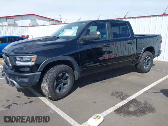 2019 Ram 1500 Rebel с VIN 1C6SRFLT2KN592652, выставлен на аукционе IAAI как лот 41989054 с пробегом 71 630 миль миль и . История ставок и продаж доступна на DreamBid. Изображение 2.