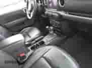 2023 Jeep Wrangler Sahara with VIN 1C4JJXP64PW684210, listed as a IAAI auction lot 42244388 with 23,622 mi miles and . Bid and sale history available at DreamBid. Image 5.