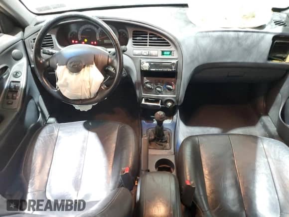 2003 Hyundai Elantra GT z VIN KMHDN55D23U082415, wystawiony jako Copart lot #45854355 z przebiegiem 165 657 mil mil oraz Szkoda całkowita • Salvage title. Historia ofert i sprzedaży dostępna na DreamBid. Obrazek 8.