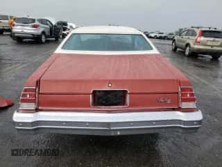 1977 Chevrolet Monte Carlo z VIN 1H57U7K464470, wystawiony jako Copart lot #71591905 z przebiegiem 31 015 mil mil oraz Szkoda całkowita • Salvage title. Historia ofert i sprzedaży dostępna na DreamBid. Obrazek 6.