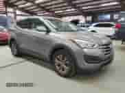 2014 Hyundai Santa Fe z VIN 5XYZTDLB8EG152578, wystawiony jako Copart lot #86886665 z przebiegiem 147 168 mil mil oraz Czysty tytuł • Clean title. Historia ofert i sprzedaży dostępna na DreamBid. Obrazek 4.