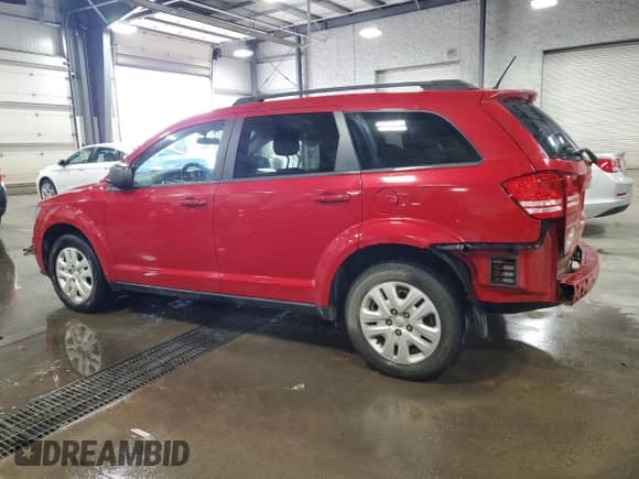 2016 Dodge Journey SE with VIN 3C4PDCAB3GT111076, listed as a Copart auction lot 71176695 with 76,046 mi miles and Salvage title. Bid and sale history available at DreamBid. Image 2.