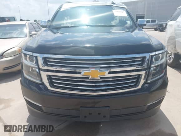 2015 Chevrolet Suburban LTZ with VIN 1GNSCKKC4FR254373, listed as a IAAI auction lot 42838527 with Not provided miles and . Bid and sale history available at DreamBid. Image 12.