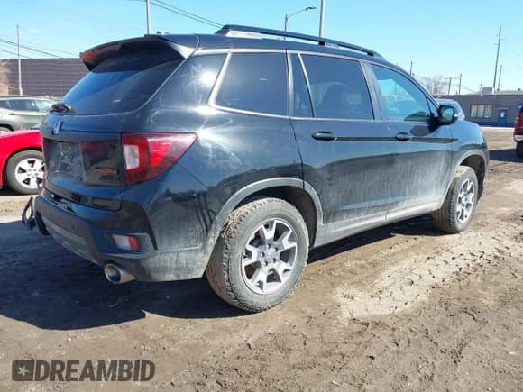2023 Honda Passport TrailSport with VIN 5FNYF8H67PB042153, listed as a IAAI auction lot 41757909 with 26,810 mi miles and . Bid and sale history available at DreamBid. Image 4.