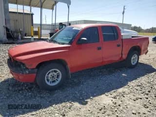 2000 Dodge Dakota Sport z VIN 1B7GL2AX1YS654082, wystawiony jako Copart lot #48739565 z przebiegiem 199 845 mil mil oraz Szkoda całkowita • Salvage title. Historia ofert i sprzedaży dostępna na DreamBid. Obrazek 1.