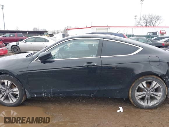 2011 Honda Accord EX with VIN 1HGCS1B70BA013174, listed as a IAAI auction lot 41604372 with 169,498 mi miles and . Bid and sale history available at DreamBid. Image 14.