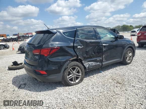 2018 Hyundai Santa Fe 2.4L z VIN 5XYZTDLB8JG541733, wystawiony jako Copart lot #69393845 z przebiegiem 103 792 mil mil oraz Szkoda całkowita • Salvage title. Historia ofert i sprzedaży dostępna na DreamBid. Obrazek 3.
