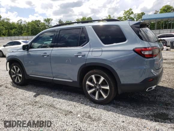 2023 Honda Pilot Touring с VIN 5FNYG2H78PB006054, выставлен на аукционе Copart как лот 56039785 с пробегом 35 831 миль миль и Списание • Salvage title. История ставок и продаж доступна на DreamBid. Изображение 2.