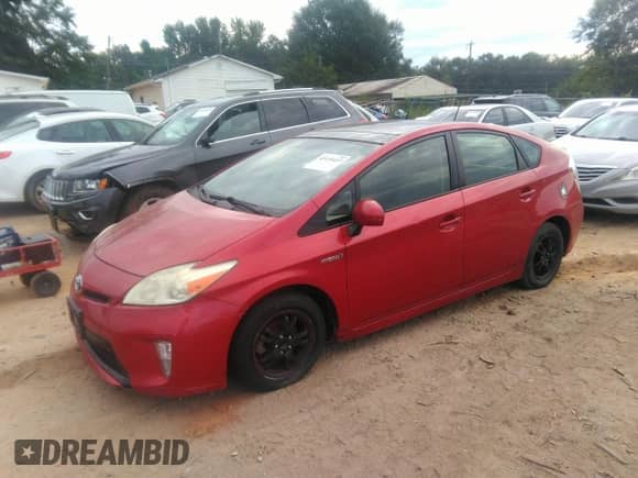 2012 Toyota Prius One with VIN JTDKN3DU7C1596831, listed as a IAAI auction lot 43135457 with 257,291 mi miles and . Bid and sale history available at DreamBid. Image 2.