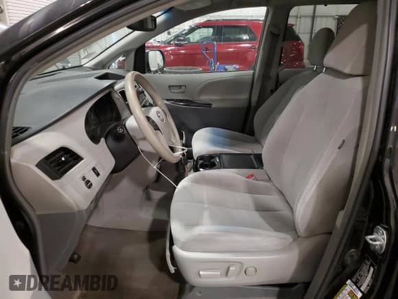 2012 Toyota Sienna LE AAS with VIN 5TDKK3DC1CS265097, listed as a Copart auction lot 86068265 with 142,841 mi miles and Salvage title. Bid and sale history available at DreamBid. Image 7.