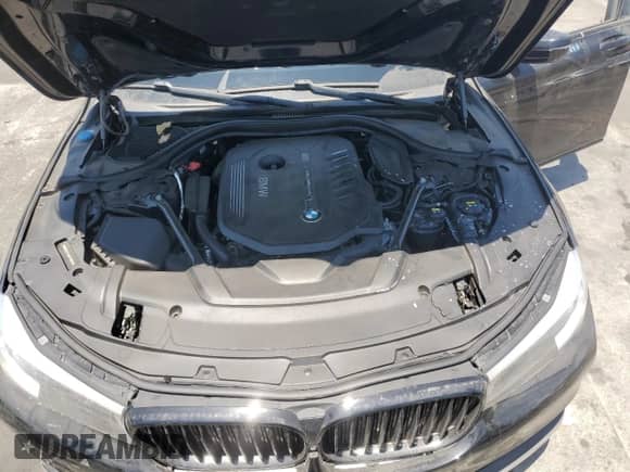 2017 BMW 7 Series 740i with VIN WBA7E2C36HG740606, listed as a Copart auction lot 65196225 with 84,940 mi miles and Salvage title. Bid and sale history available at DreamBid. Image 11.