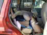 2003 Jeep Grand Cherokee Laredo z VIN 1J4GX48S13C547993, wystawiony jako Copart lot #67148165 z przebiegiem Nie podano mil oraz Szkoda całkowita • Salvage title. Historia ofert i sprzedaży dostępna na DreamBid. Obrazek 11.