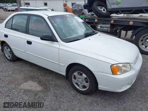 2000 Hyundai Accent with VIN KMHCG45G4YU054553, listed as a IAAI auction lot 43004889 with 72,789 mi miles and . Bid and sale history available at DreamBid. Image 1.