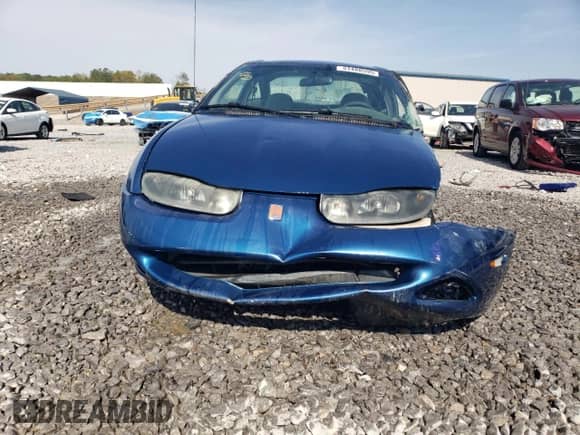 2001 Saturn SC with VIN 1G8ZP12891Z314605, listed as a Copart auction lot 51488595 with 220,219 mi miles and Salvage title. Bid and sale history available at DreamBid. Image 5.