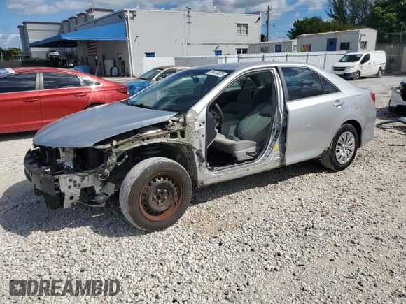 2012 Toyota Camry SE with VIN 4T1BF1FK0CU583233, listed as a Copart auction lot 86479305 with 171,907 mi miles and Salvage title. Bid and sale history available at DreamBid. Image 1.