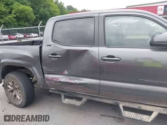 2017 Toyota Tacoma SR5 with VIN 5TFAZ5CN8HX046113, listed as a IAAI auction lot 42706907 with 130,857 mi miles and . Bid and sale history available at DreamBid. Image 6.