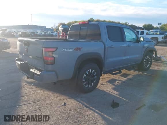 2023 Nissan Frontier Pro-4X with VIN 1N6ED1EKXPN670644, listed as a IAAI auction lot 43366765 with 13,230 mi miles and . Bid and sale history available at DreamBid. Image 4.