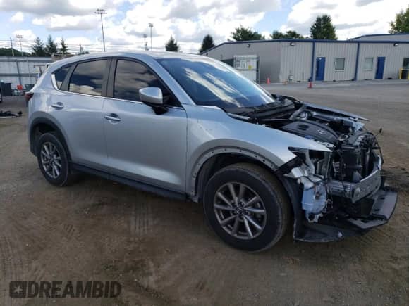 2022 Mazda CX-5 S Preferred with VIN JM3KFBCM7N0564454, listed as a Copart auction lot 70213455 with 35,235 mi miles and Salvage title. Bid and sale history available at DreamBid. Image 4.