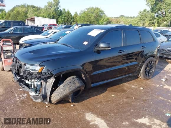 2021 Jeep Grand Cherokee Trackhawk z VIN 1C4RJFN94MC786470, wystawiony jako IAAI lot #42877128 z przebiegiem 47 250 mil mil oraz . Historia ofert i sprzedaży dostępna na DreamBid. Obrazek 22.