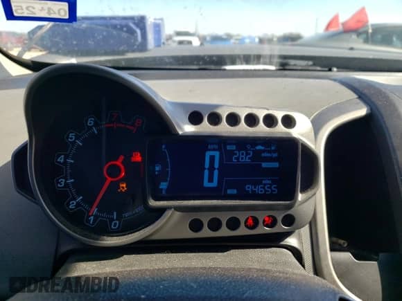 2012 Chevrolet Sonic LT z VIN 1G1JD6SH4C4231312, wystawiony jako Copart lot #43200445 z przebiegiem 94 655 mil mil oraz Szkoda całkowita • Salvage title. Historia ofert i sprzedaży dostępna na DreamBid. Obrazek 9.