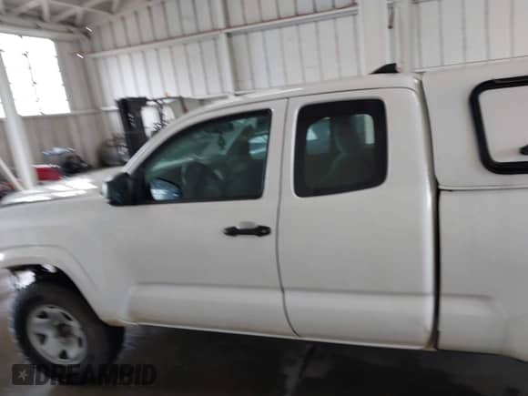 2018 Toyota Tacoma SR with VIN 5TFRX5GN9JX122396, listed as a IAAI auction lot 42933585 with 107,492 mi miles and . Bid and sale history available at DreamBid. Image 14.