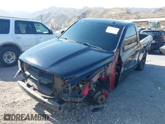 2014 Ram 1500 Express z VIN 3C6JR6AT5EG305140, wystawiony jako IAAI lot #42444478 z przebiegiem 140 072 mil mil oraz . Historia ofert i sprzedaży dostępna na DreamBid. Obrazek 23.