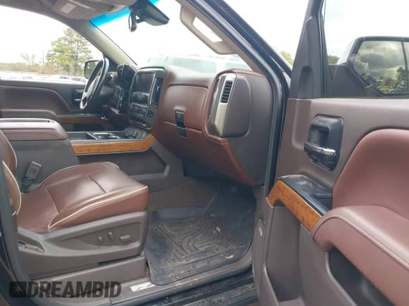 2014 Chevrolet Silverado 1500 High Country z VIN 3GCUKTEJ2EG475750, wystawiony jako IAAI lot #43555633 z przebiegiem Nie podano mil oraz . Historia ofert i sprzedaży dostępna na DreamBid. Obrazek 5.