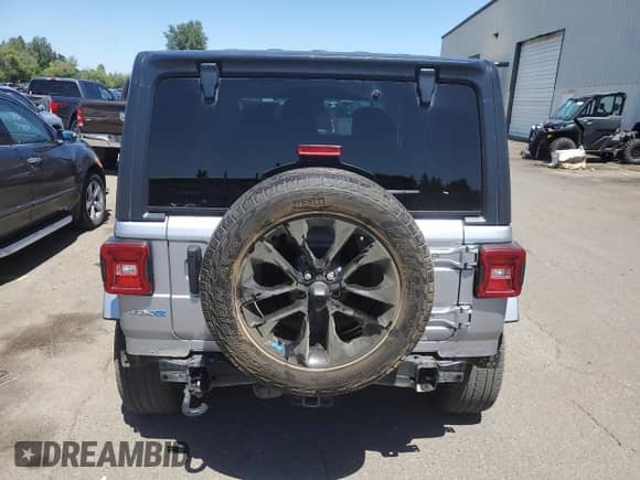 2021 Jeep Wrangler Unlimited Sahara with VIN 1C4JJXP65MW692229, listed as a Copart auction lot 65685825 with 80,009 mi miles and Salvage title. Bid and sale history available at DreamBid. Image 6.