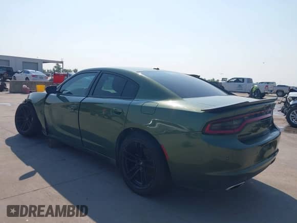 2021 Dodge Charger SXT with VIN 2C3CDXBG7MH544893, listed as a IAAI auction lot 42897509 with 75,146 mi miles and . Bid and sale history available at DreamBid. Image 3.