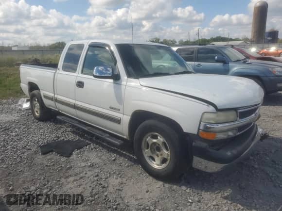 2001 Chevrolet Silverado 1500 LS с VIN 2GCEC19V711148590, выставлен на аукционе Copart как лот 84185575 с пробегом 209 680 миль миль и Списание • Salvage title. История ставок и продаж доступна на DreamBid. Изображение 4.