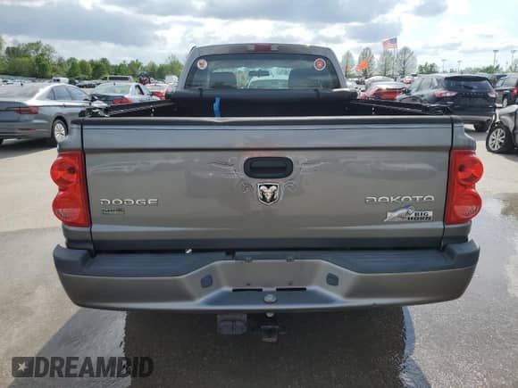 2010 Dodge Dakota z VIN 1D7CE3BP0AS188752, wystawiony jako Copart lot #54577675 z przebiegiem 94 026 mil mil oraz Czysty tytuł • Clean title. Historia ofert i sprzedaży dostępna na DreamBid. Obrazek 6.