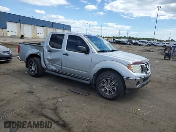 2011 Nissan Frontier Pro-4X z VIN 1N6AD0EV2BC427109, wystawiony jako Copart lot #70246975 z przebiegiem 109 960 mil mil oraz Czysty tytuł • Clean title. Historia ofert i sprzedaży dostępna na DreamBid. Obrazek 4.