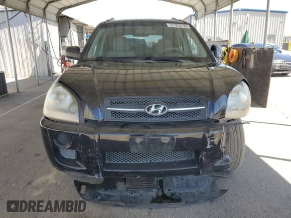 2005 Hyundai Tucson GL z VIN KM8JM12B95U209584, wystawiony jako Copart lot #61252765 z przebiegiem 190 773 mil mil oraz Szkoda całkowita • Salvage title. Historia ofert i sprzedaży dostępna na DreamBid. Obrazek 5.