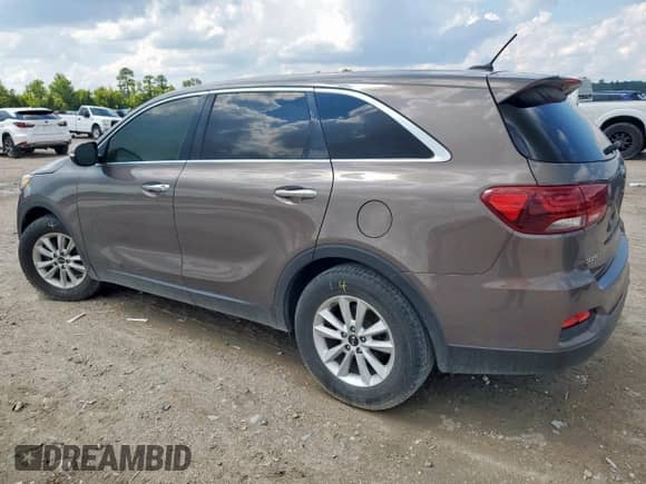 2019 Kia Sorento LX with VIN 5XYPG4A55KG484014, listed as a Copart auction lot 71096025 with 148,173 mi miles and Salvage title. Bid and sale history available at DreamBid. Image 2.