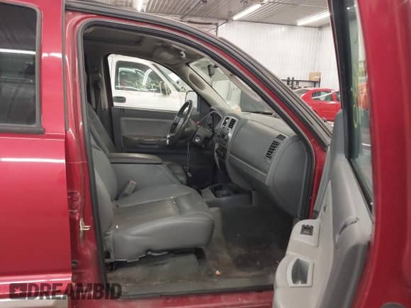 2007 Dodge Dakota SLT with VIN 1D7HW48J77S119738, listed as a IAAI auction lot 43119995 with 159,735 mi miles and . Bid and sale history available at DreamBid. Image 5.