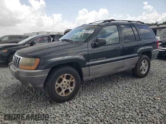 1999 Jeep Grand Cherokee Laredo с VIN 1J4G258S4XC577449, выставлен на аукционе Copart как лот 66556115 с пробегом 220 256 миль миль и Чистый • Clean title. История ставок и продаж доступна на DreamBid. Изображение 1.