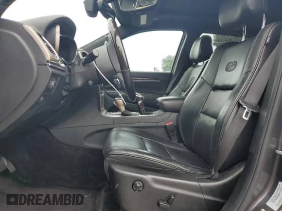 2017 Jeep Grand Cherokee Overland with VIN 1C4RJECG5HC605538, listed as a Copart auction lot 81946415 with 100,658 mi miles and Salvage title. Bid and sale history available at DreamBid. Image 7.