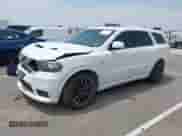 2018 Dodge Durango SRT with VIN 1C4SDJGJ2JC434843, listed as a IAAI auction lot 42434327 with 144,483 mi miles and . Bid and sale history available at DreamBid. Image 2.