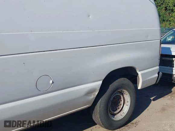 2009 Ford Econoline Cargo Commercial z VIN 1FTNE24W19DA72591, wystawiony jako IAAI lot #43074984 z przebiegiem 239 039 mil mil oraz . Historia ofert i sprzedaży dostępna na DreamBid. Obrazek 14.