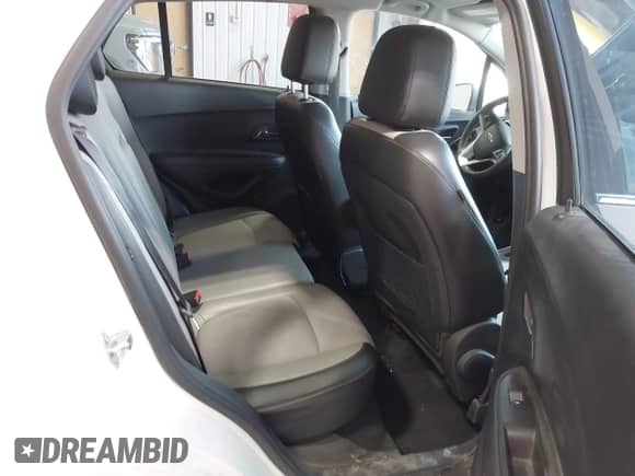 2015 Chevrolet Trax LT z VIN 3GNCJLSB6FL245883, wystawiony jako IAAI lot #42956571 z przebiegiem 144 846 mil mil oraz . Historia ofert i sprzedaży dostępna na DreamBid. Obrazek 8.
