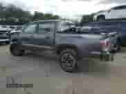 2023 Toyota Tacoma SR z VIN 3TYCZ5AN2PT126947, wystawiony jako Copart lot #70491195 z przebiegiem 69 236 mil mil oraz Szkoda całkowita • Salvage title. Historia ofert i sprzedaży dostępna na DreamBid. Obrazek 2.