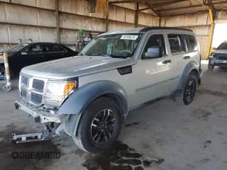 2008 Dodge Nitro SXT with VIN 1D8GT28K88W286116, listed as a Copart auction lot 56769675 with 211,006 mi miles and Salvage title. Bid and sale history available at DreamBid. Image 1.