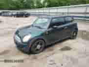 2007 MINI Hardtop with VIN WMWMF33537TL77985, listed as a Copart auction lot 61908635 with 180,470 mi miles and Salvage title. Bid and sale history available at DreamBid. Image 1.