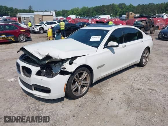 2013 BMW 7 Series 740Li with VIN WBAYE4C58DDW22876, listed as a IAAI auction lot 42418789 with 174,313 mi miles and . Bid and sale history available at DreamBid. Image 2.