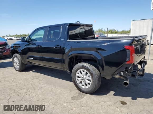 2024 Toyota Tacoma SR5 with VIN 3TMLB5JNXRM054298, listed as a Copart auction lot 66528135 with 5,976 mi miles and Salvage title. Bid and sale history available at DreamBid. Image 2.