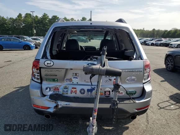 2012 Subaru Forester X Limited z VIN JF2SHAEC5CH444962, wystawiony jako Copart lot #68594975 z przebiegiem 198 976 mil mil oraz Szkoda całkowita • Salvage title. Historia ofert i sprzedaży dostępna na DreamBid. Obrazek 6.