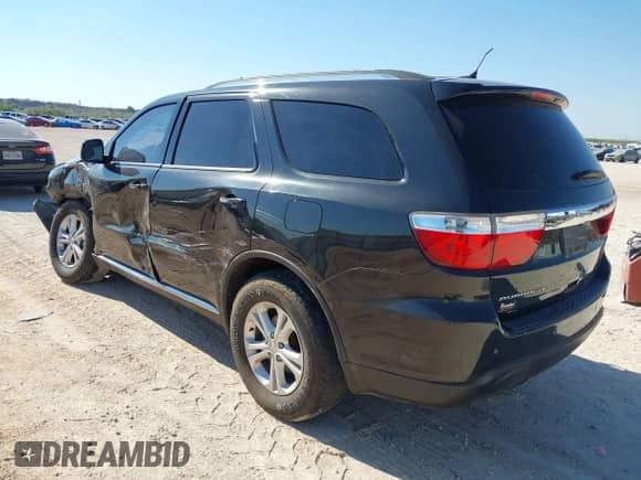 2012 Dodge Durango SXT with VIN 1C4RDHAG8CC257738, listed as a IAAI auction lot 43450056 with 238,081 mi miles and . Bid and sale history available at DreamBid. Image 3.