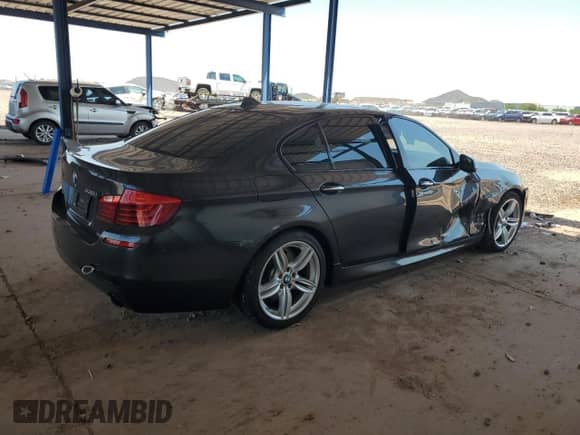 2015 BMW 5 Series 535i с VIN WBA5B1C56FD918847, выставлен на аукционе Copart как лот 69878485 с пробегом 62 285 миль миль и Списание • Salvage title. История ставок и продаж доступна на DreamBid. Изображение 3.