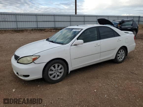 2003 Toyota Camry XLE with VIN 4T1BE32K13U128900, listed as a Copart auction lot 81103545 with 152,430 mi miles and Salvage title. Bid and sale history available at DreamBid. Image 1.